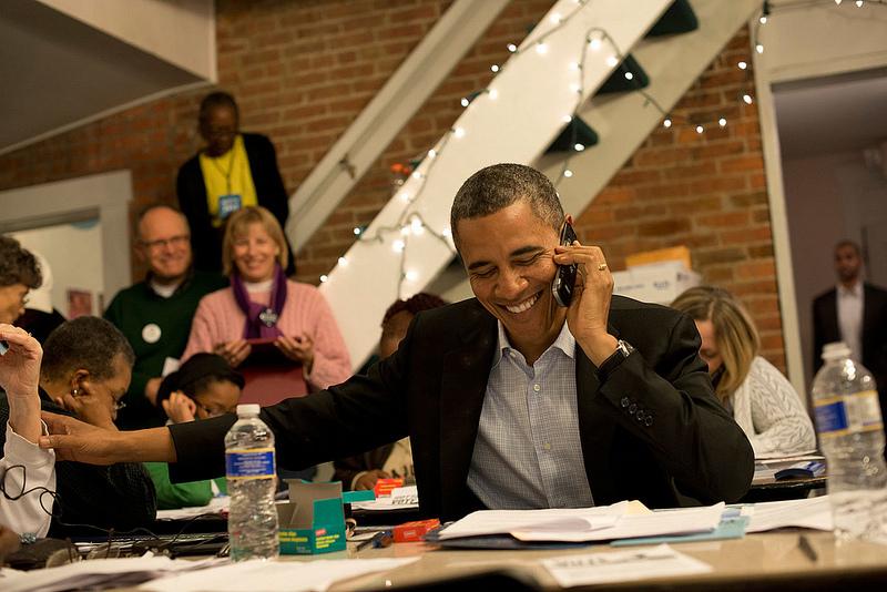President Barack Obama makes phone calls while on the campaign trail. Photo by Scout Tufankjian for Obama for America