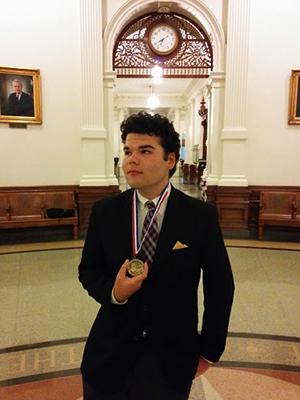 Senior Berryman Toler celebrates at the University of Texas after winning 5th place at the UIL Congressional Debate State Tournament. Courtesy photo