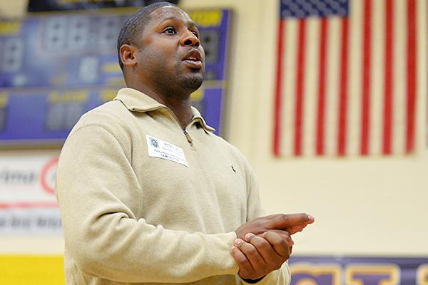 Former pro athlete Quan Cosby talks with AVID students during an assembly on Friday. Cosby said although he spent time after high school playing baseball in the Anaheim Angels organization, he always knew he would return to school to get his degree. Talon photo by Elise Garcia