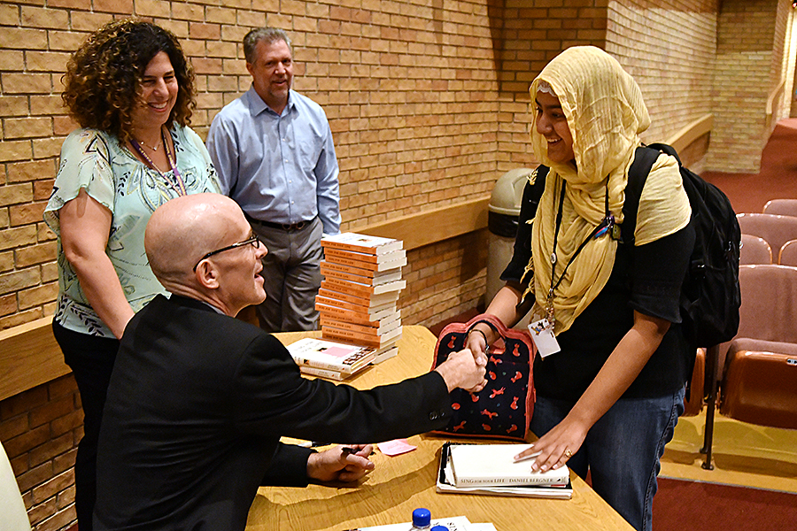 Tania Kardar gets book signed by Daniel Bergner at Richardson Reads One Book. photo by Jack Liber