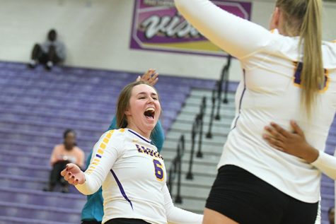 Senior Allie Cunyus celebrates a point at a home game against Coppell high school. Talon photo by Chad Byrd.