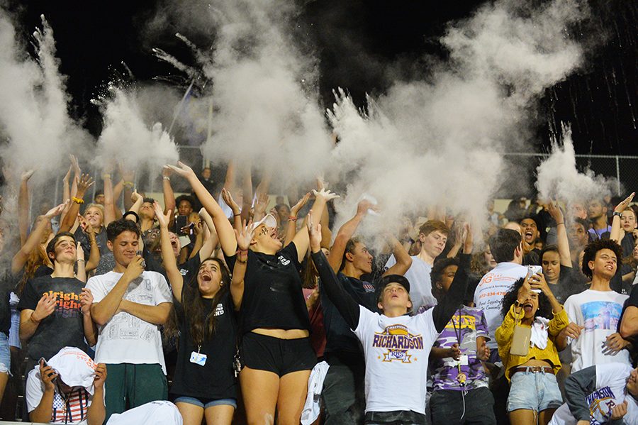 Students throw up baby powder at the start of the second half of the Pearce game. With a win against Lake Highlands, the football team could land the last playoff spot. Photo by Daphne Lynd