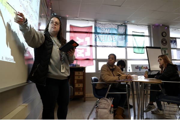 Katherine Dodgen teaches during first period Algebra 2. She [Elaine Dodgen] was always really supportive of everything that I wanted to do, Dodgen said. Even when there were people who doubted me, she always believed in me. Photo credit: Shea Southern