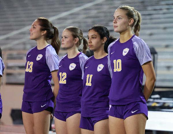 Sydney and Shianne are cousins who have played soccer together since kindergarten and now play for the varsity soccer team. Talon photo by Hudson Morris.