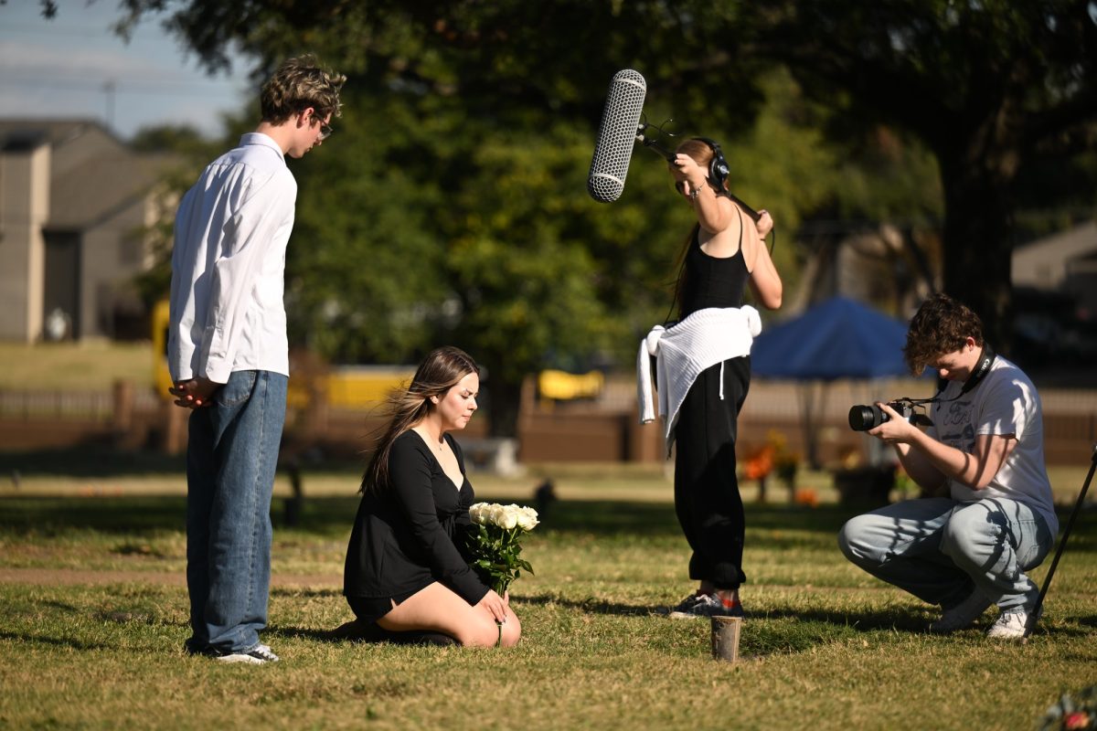 Seniors Eagan Cook, Delilah Gomez, Grace Johnson, and Connor Coalson work together on a scene for their extended short film "Special Delivery." The Communications magnet seniors are producing a fully student-led extended short film and are on rack to become the first group since 2019 to complete the project. “We all learned how much we rely on each other,” Cook said. “You cannot make a film alone.” Talon photo by Henry Fair