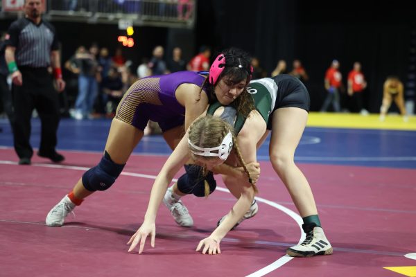 Junior Ray Perez battles out against her opponent before eventually getting pinned. Senior boy wrestler Macauley Fuld, senior girl wrestler Escarleth Pena and Perez finished the 2026 UIL Wrestling State Championship last Friday after losing both of their rounds. "I'm just kind of blessed to be able to have made it," Perez said. Talon photo by Hudson Morris