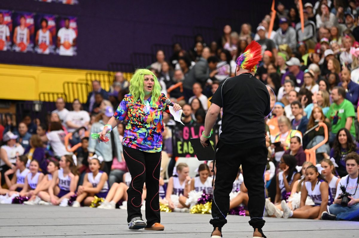 AVID coordinator Elizabeth Brown and Theatre Collective head director Erik Archilla perform a skit during the senior pep rally. Brown has helped organize pep rallies for almost a decade, while being the one of the emcees alongside Archilla. “What I love the most is hearing how much fun everybody had and how much they enjoyed it, and how much they loved seeing their friends perform,” Brown said. Talon photo by Lucio Varagas Stoyanoff