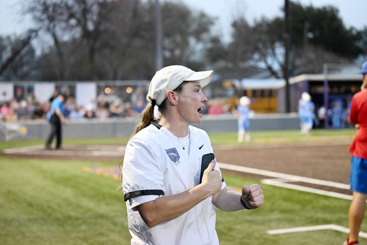 Assistant softball coach Hailey Winter is the new assistant coach for the softball team this year. “Coach Winter is probably the best new coach I’ve ever gotten,” senior Mia Keeler said. “She has the best energy.” Talon photo by Henry Fair