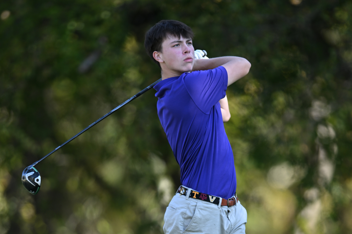 Senior Ari Rosenberg takes a swing at the 18th annual Eagle Classic Golf Tournament. The Golf team held its annual Eagle Classic Golf Tournament on November 11th at the Firewheel Golf Park to raise money for the golf team and their future trips. Talon photo by Hudson Morris